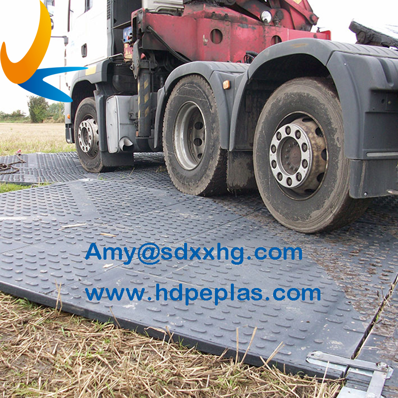 Heavy duty ground protection mats in construction site